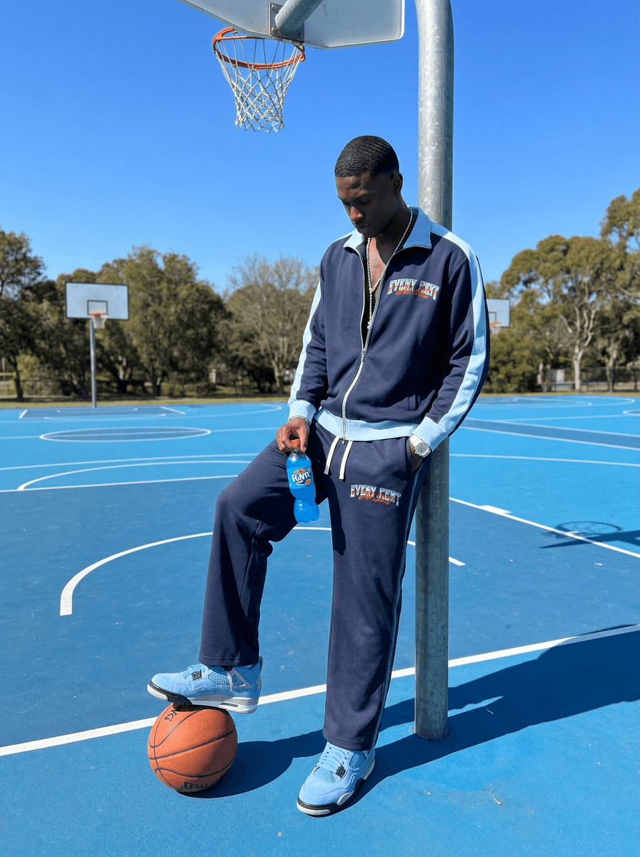 Every Cent All Stars track jacket on the court