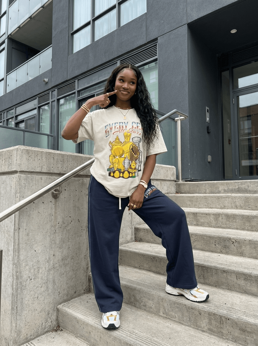 Every Cent All Stars tee on the stairs